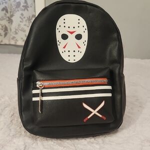 Stylish Black Backpack with Hockey Mask Design